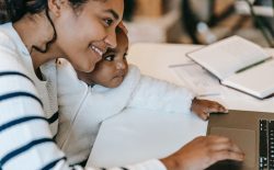 mother at computer with child